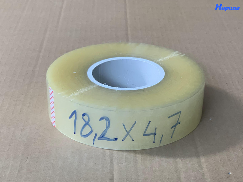 Băng dính trong cuộn 0.9kg lõi thạch cao 10mm