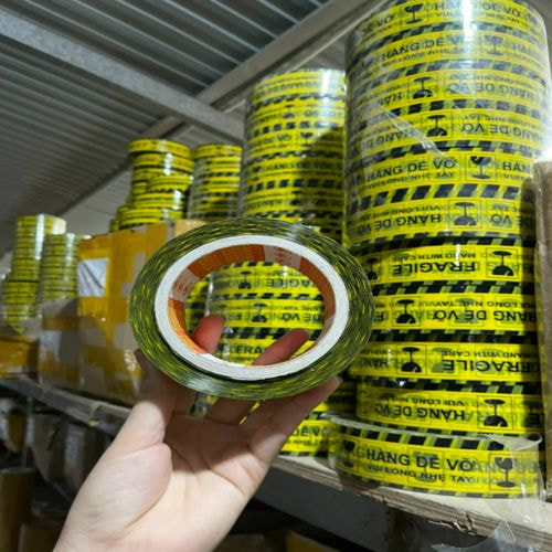 Băng dính logo dễ vỡ 1.2 kg/cây lõi giấy 5mm