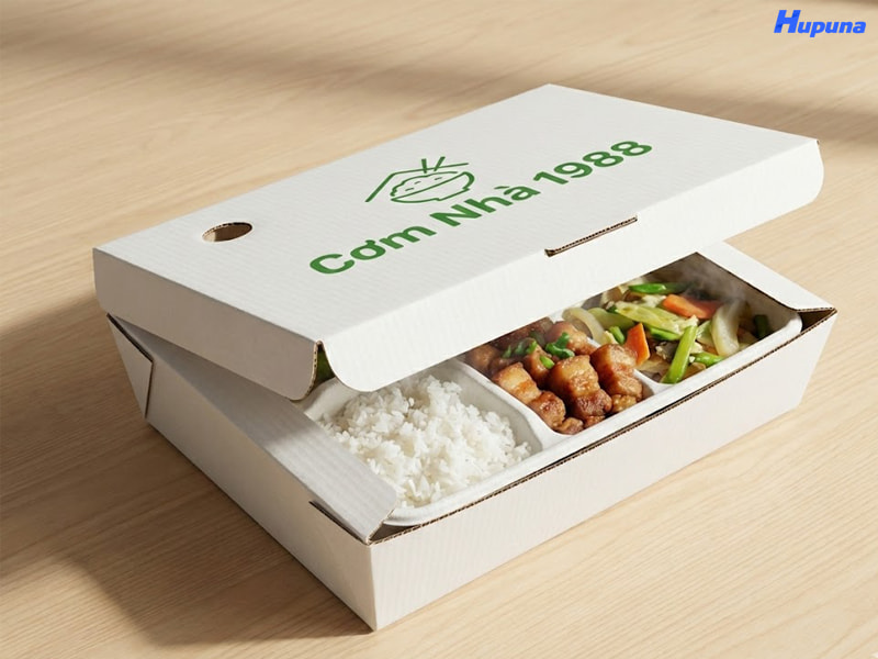 Hộp giấy đựng đồ ăn của thương hiệu Cơm Nhà 1988