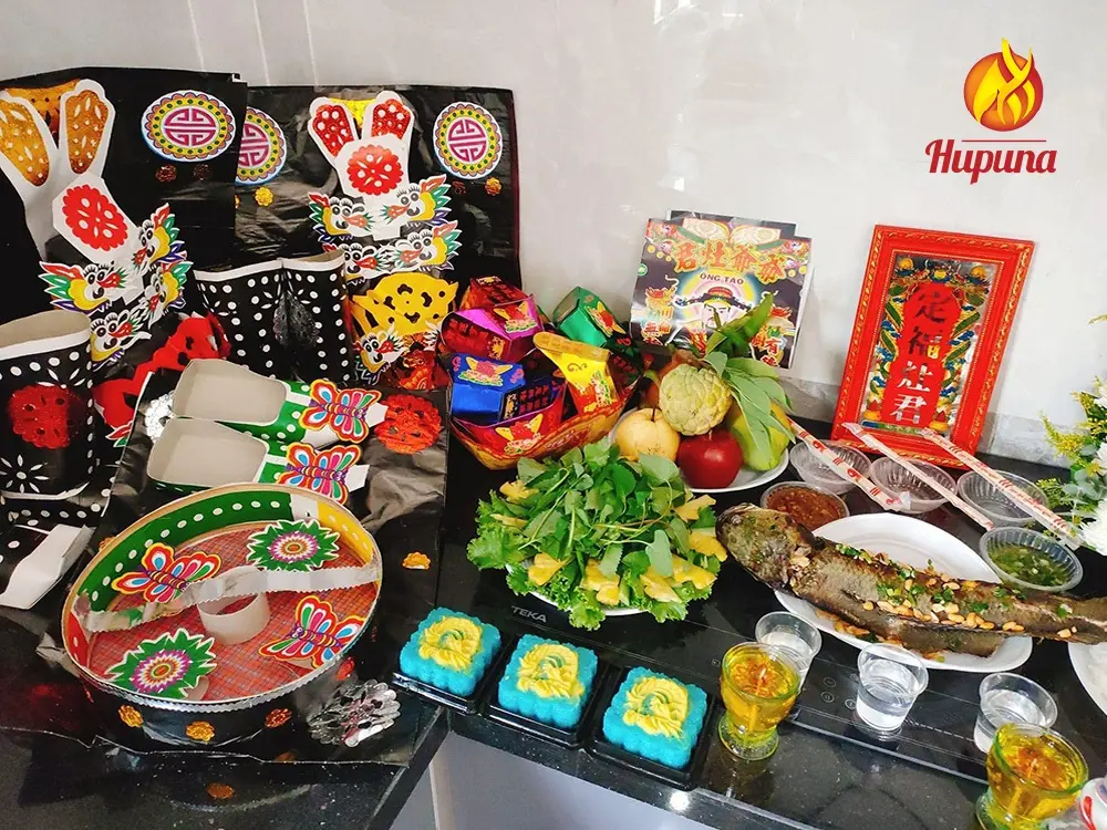 tập quán ngày tết, đoàn tụ bên gia đình, cúng ông Công, ông Táo, gói bánh chưng, bánh tét, chơi hoa dịp Tết, bày mâm ngũ quả