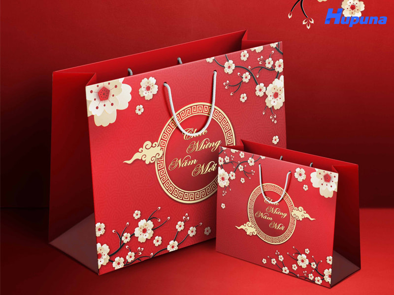 Chất liệu giấy in túi đựng quà tết