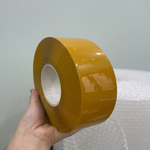 Băng dính vàng đục ảnh 2